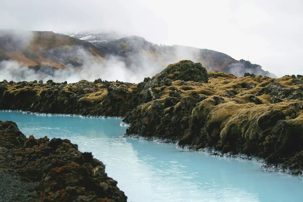 Blue Lagoon geothermal spa surrounded by volcanic landscapes in Iceland with private taxi transfers available.