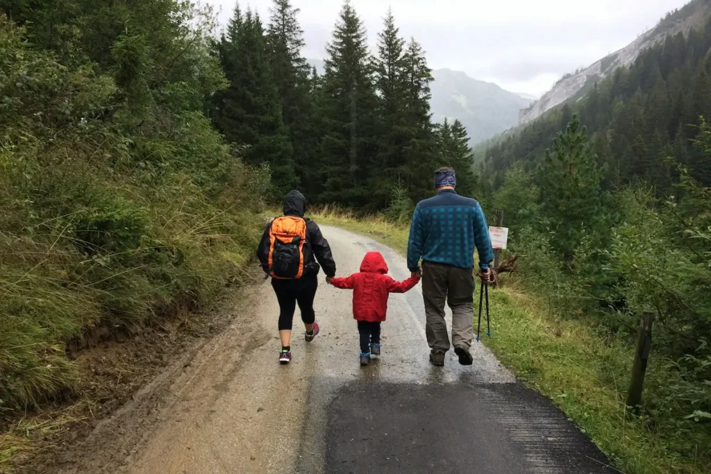 Family hiking through an Icelandic landscape