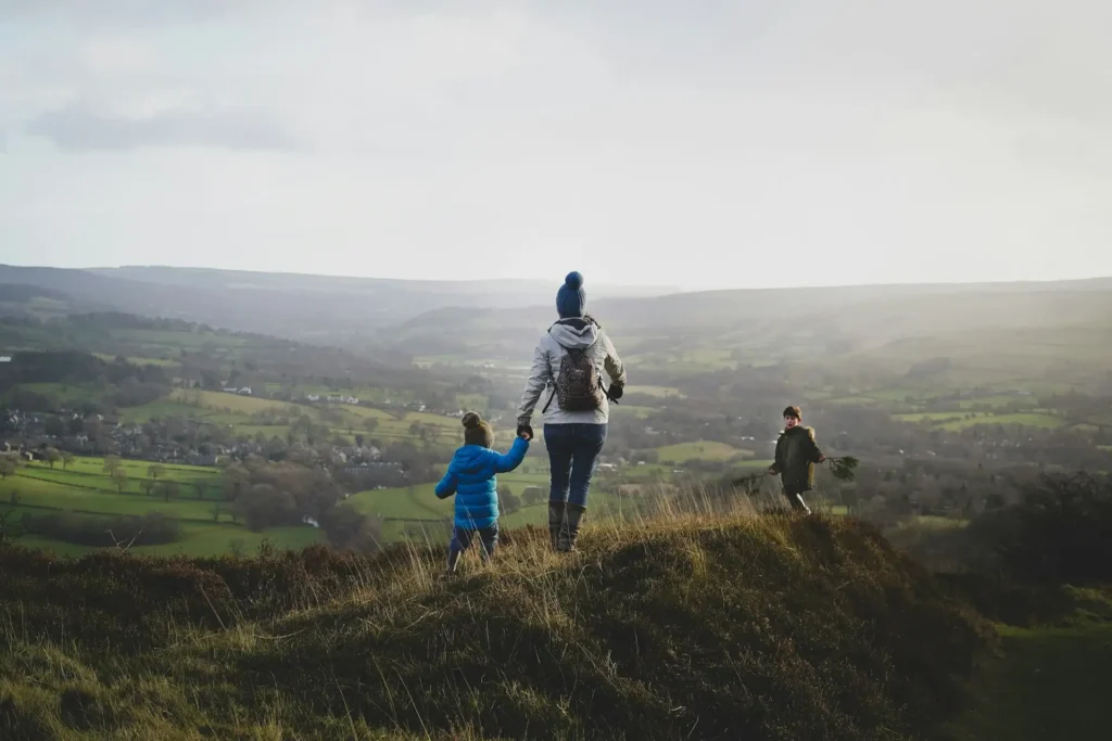 Family hiking through the Icelandic countryside